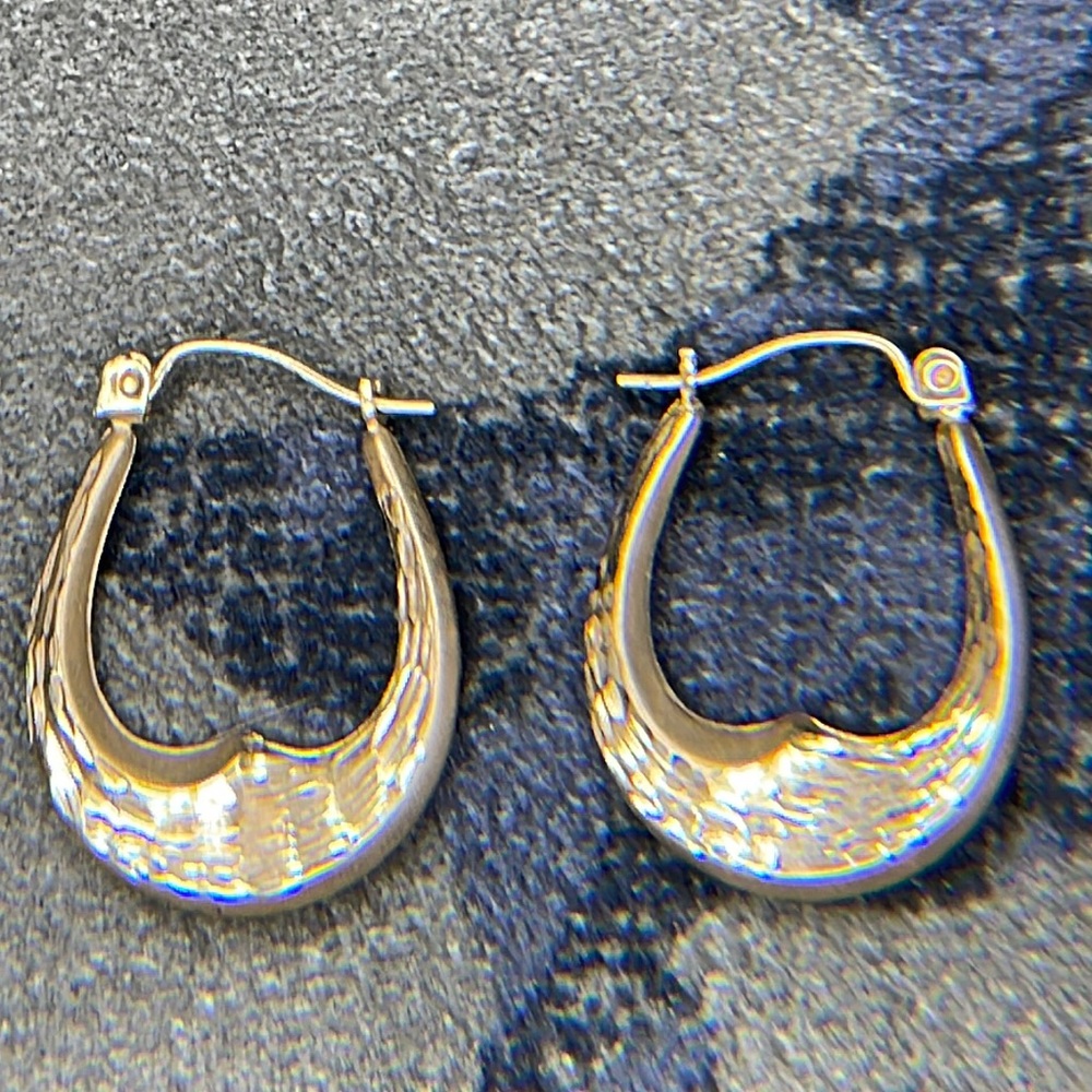10k JCM Diamond cut dangle earrings
